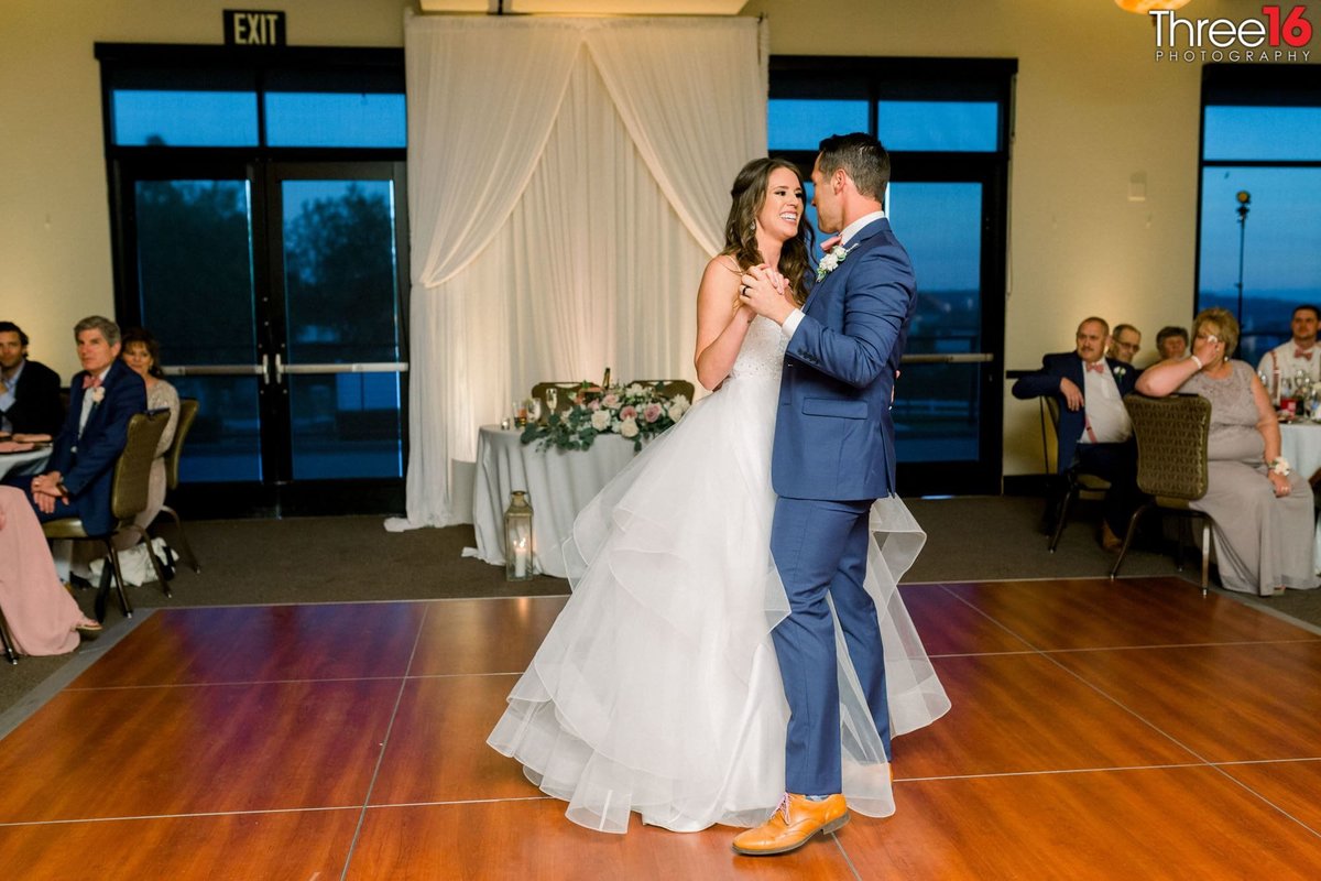 Bride and Groom share their first dance together as a married couple