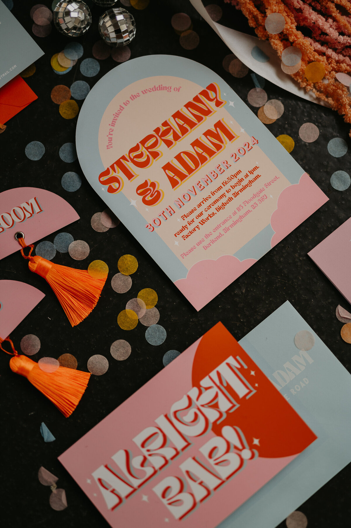 Blue and pink wedding stationery.