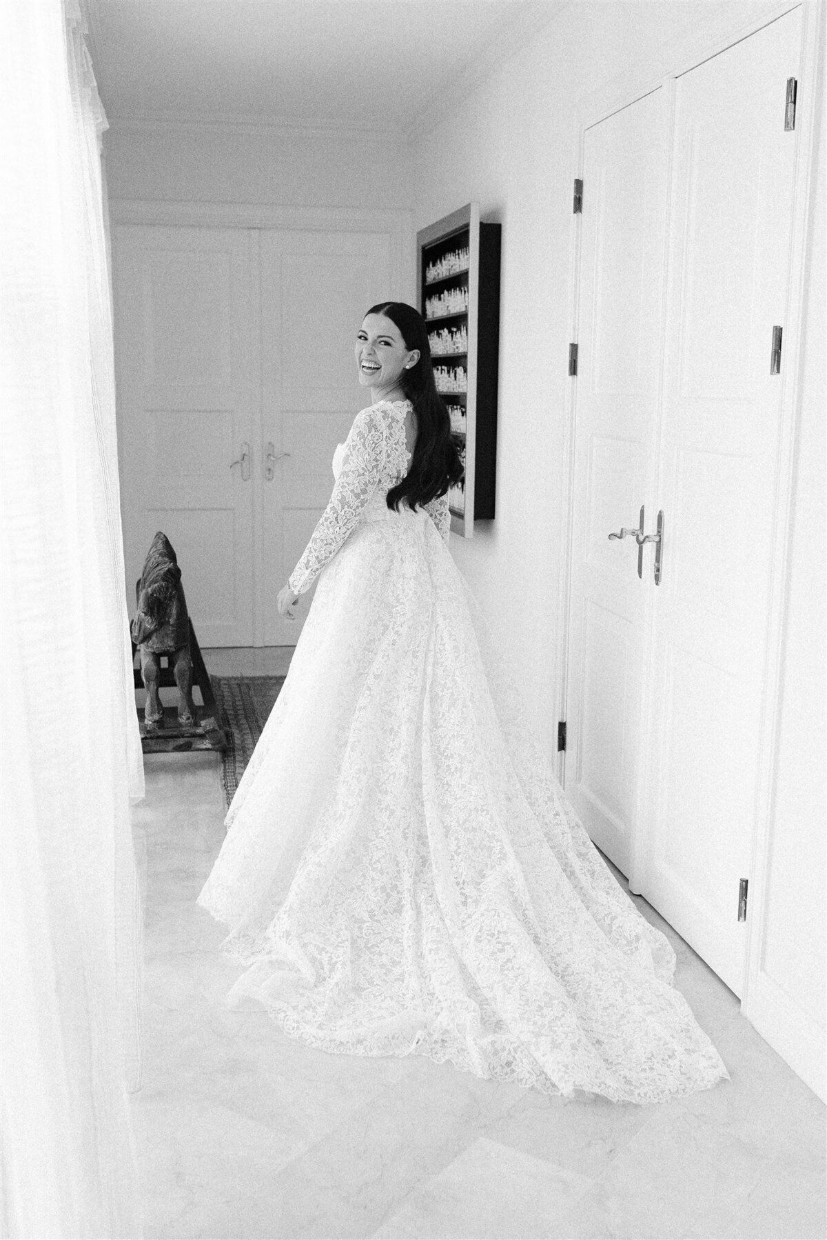 mexican bride wearing monique lhuillier bridal gown getting ready for her luxury aruba destination wedding.