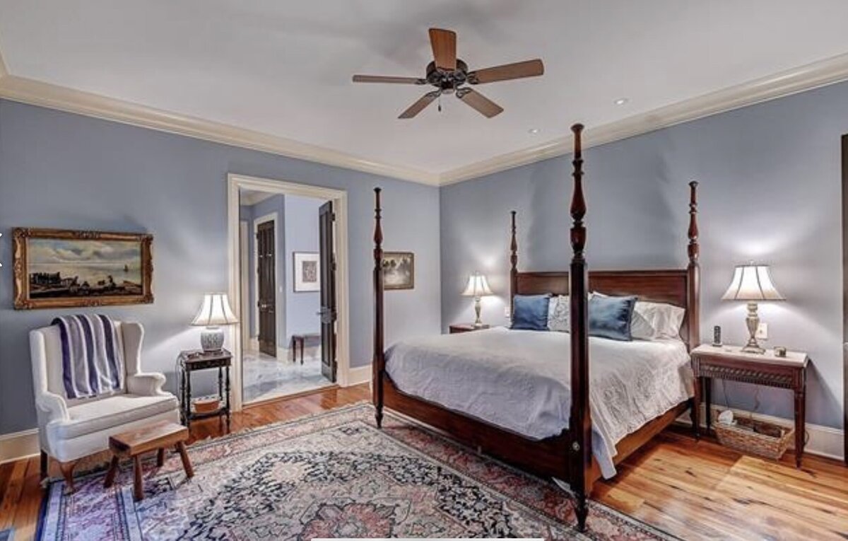 Before Sutton Place Homes partnered for this renovation, this was the master bedroom.
