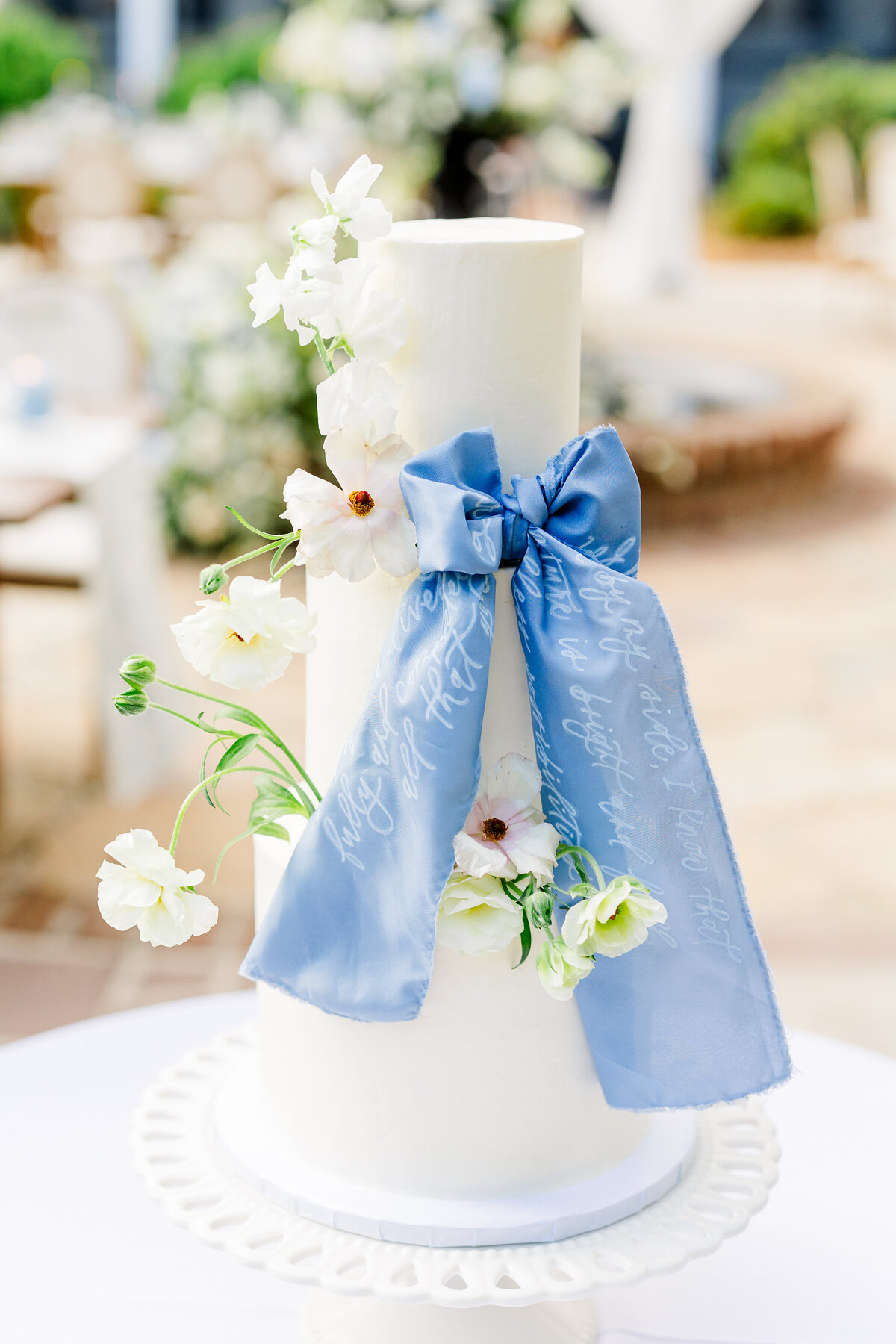 Wedding cake with vows written on it