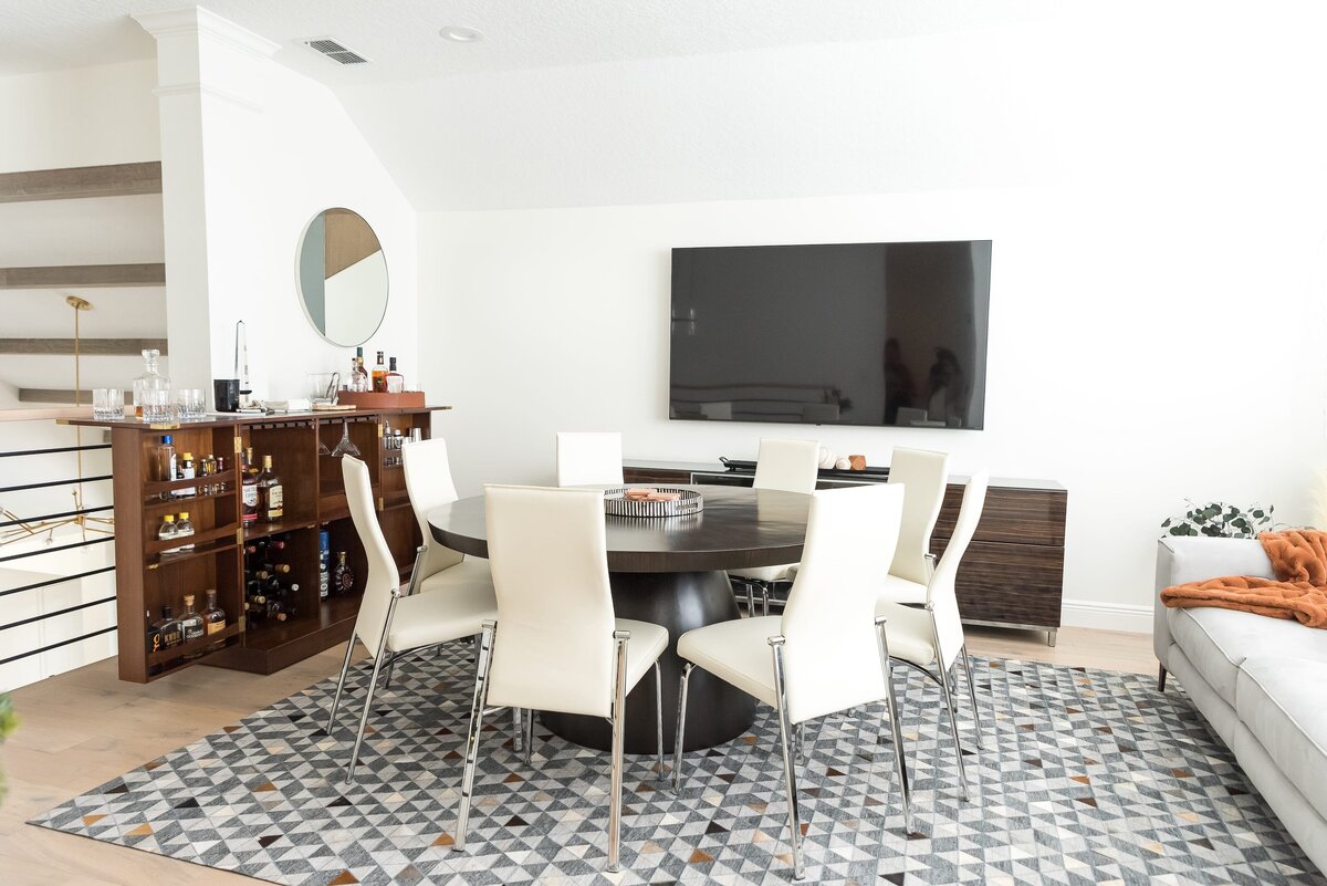 dewine design orlando interior designer modern lakehouse gametable white chars with bar and tv