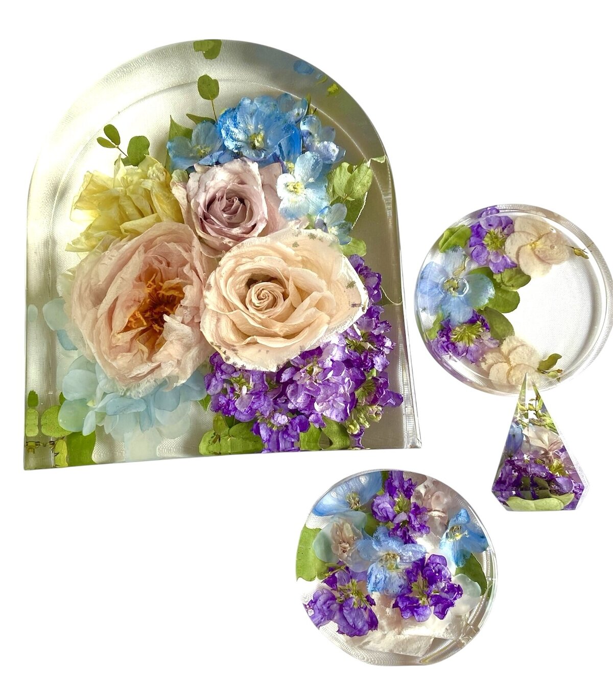 arch circle and ring holder resin block with bright purple blue and creme wedding bouquet flowers preserved as a timeless keepsake