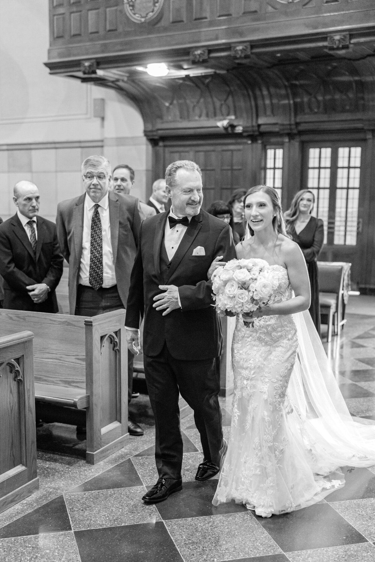 The father of the Bride walks his daughter down the aisle