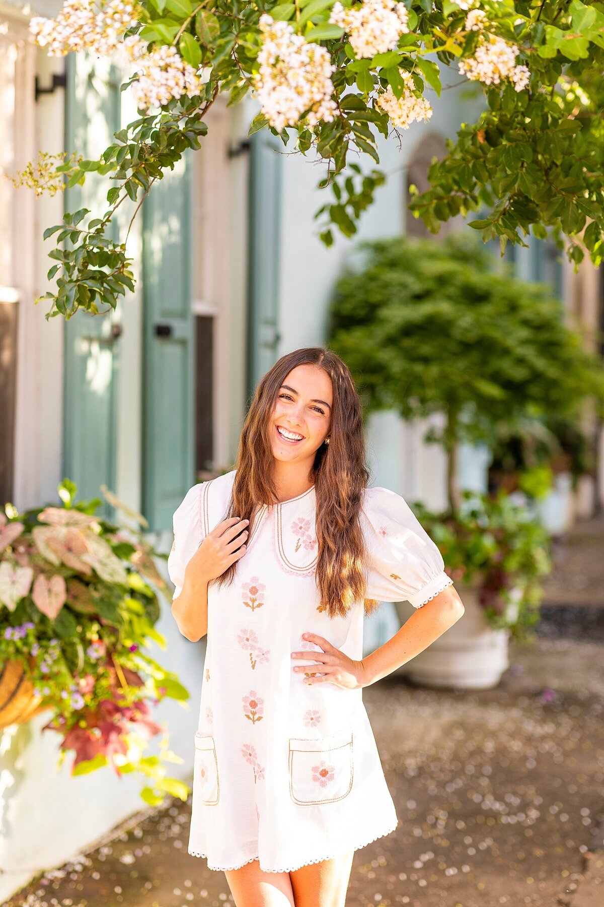Charleston high school senior portrait on Rainbow Row, capturing authentic personality and timeless elegance