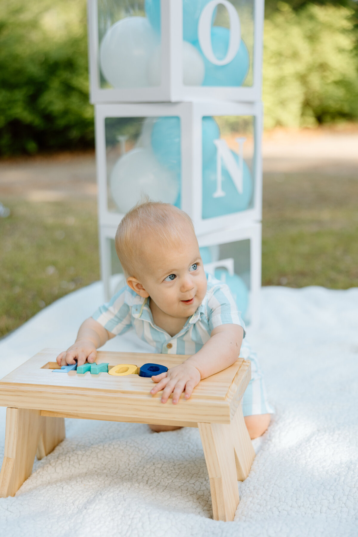 Baby's first birthday photoshoot with a smash cake