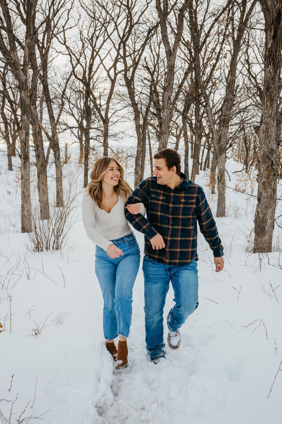couple-walking-on-snow