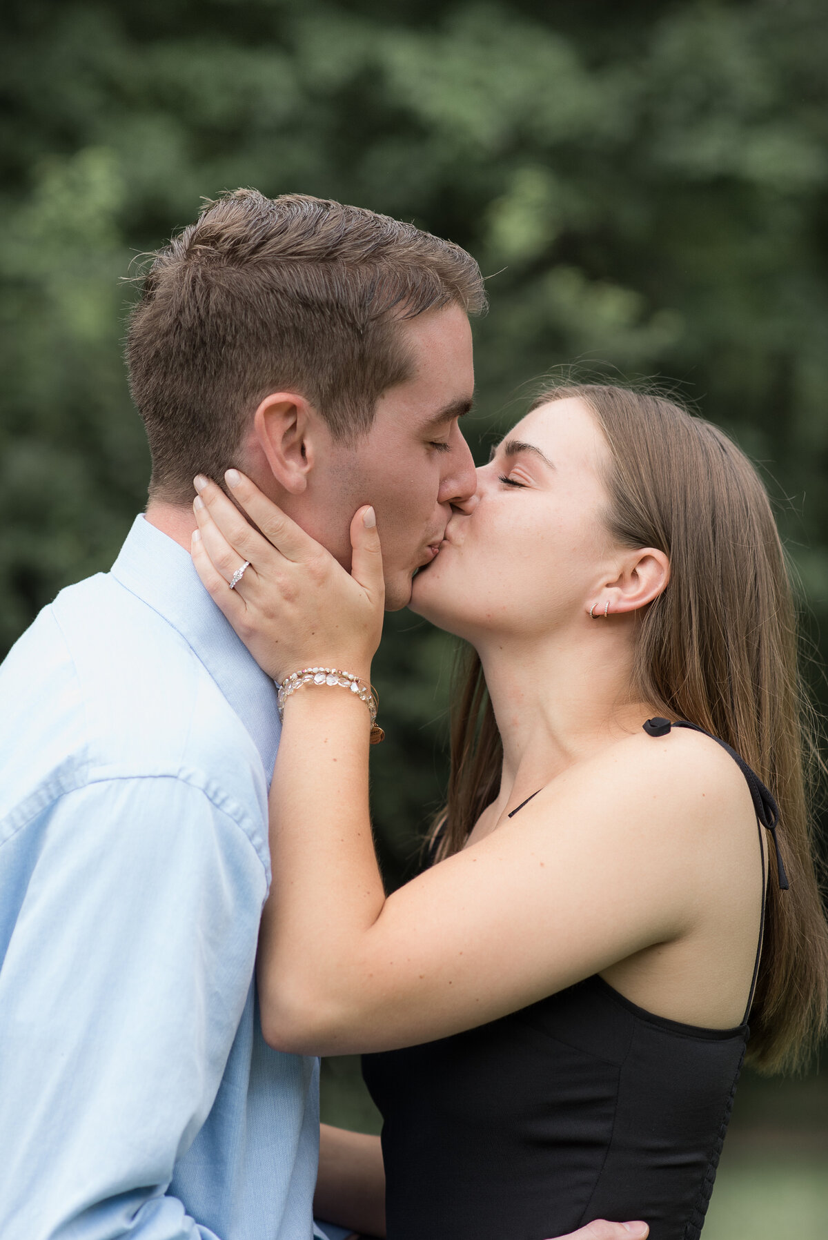 Surprise Proposal Kiss  at  Park by Michelle Lynn Photography