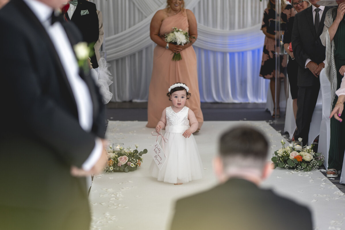 Isla walking down the aisle
