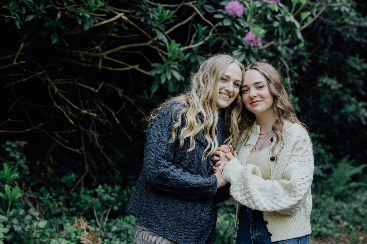 sister-holding-hand-lismore