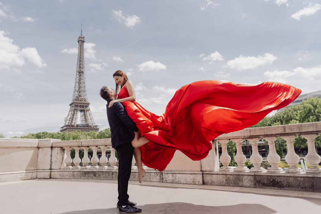 Flying dress photoshoot Paris, couple portrait, Eiffel Tower background, romantic photography session