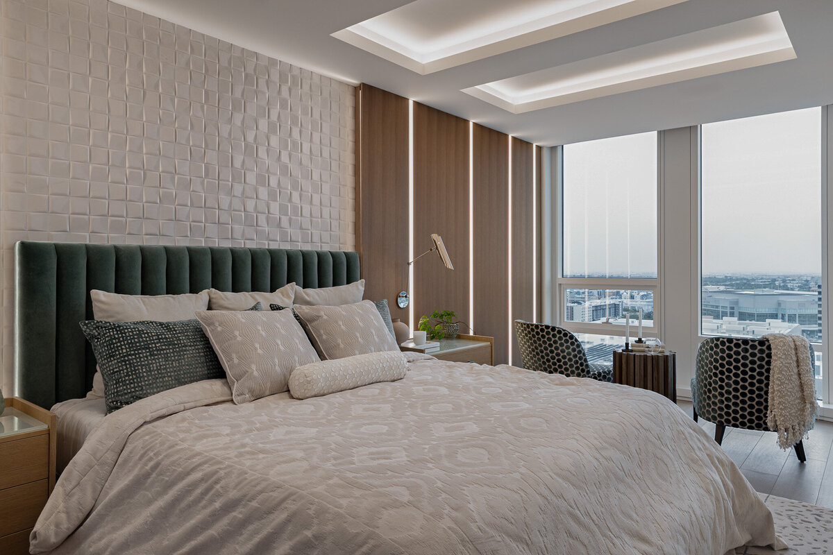 Wide shot of bedroom with custom millwork and lighting, textured wallpaper and patterned furnishings by Sister Studio