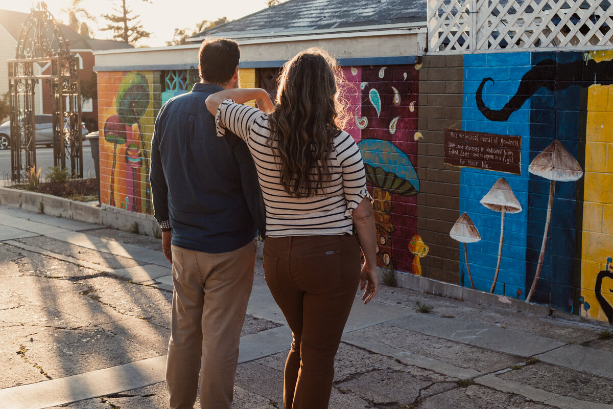 Beth and Mike Royal in front of a local San Diego mural