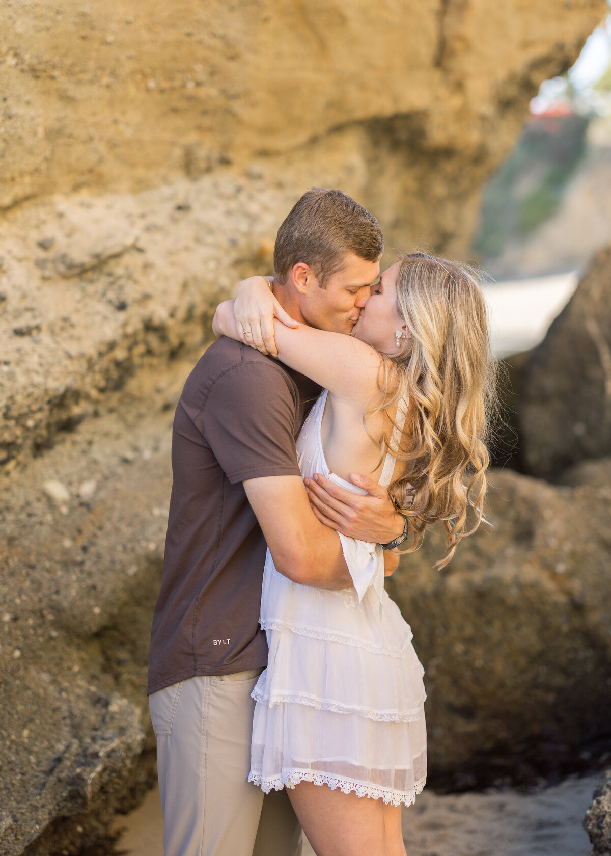 couple kissing on the beach