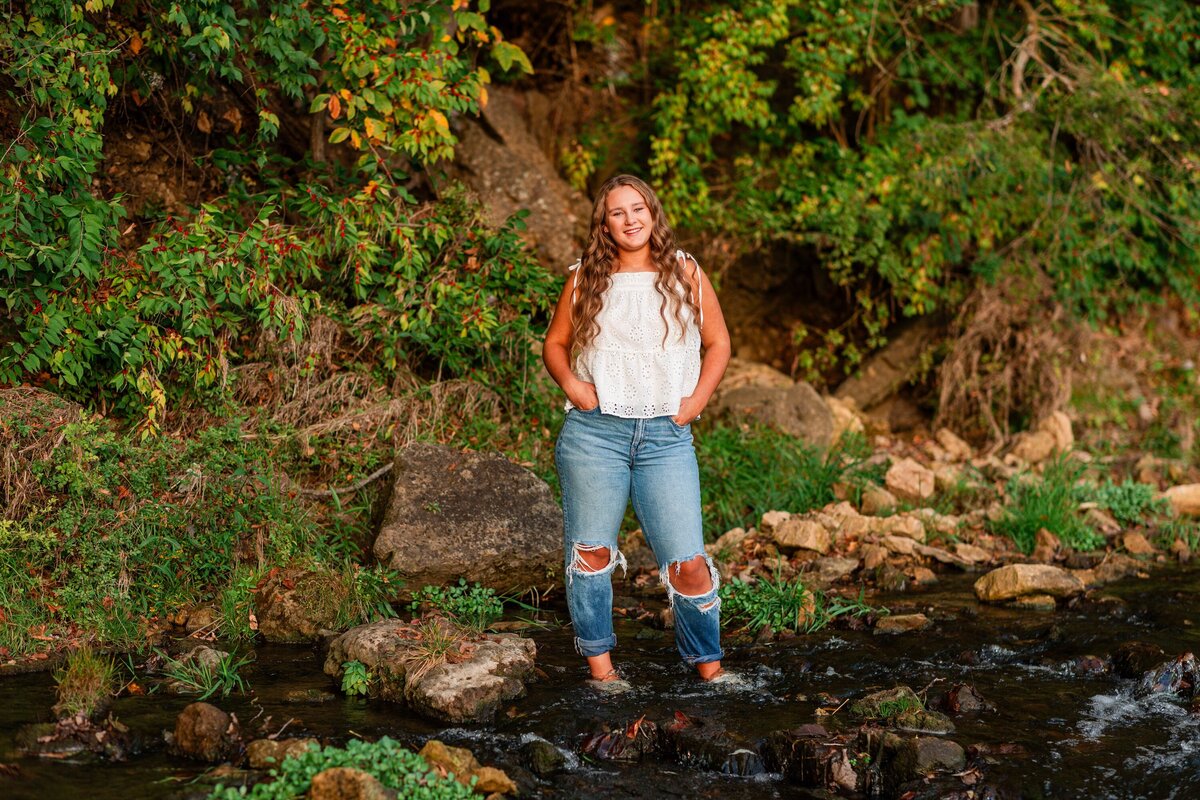 wisconsin-high-school-senior-girl-standing-in-creek