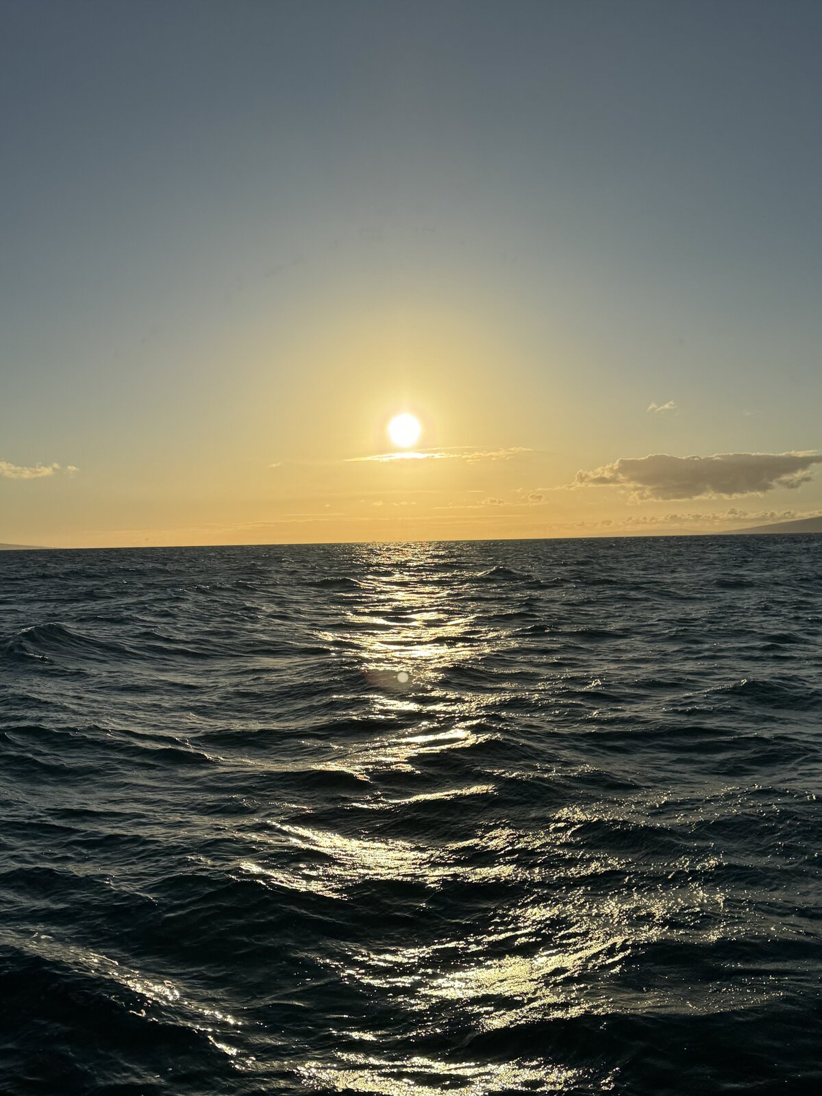 sunset over dark water