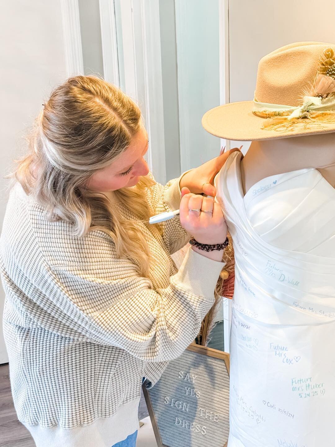Happy bride celebrating her yes to the dress at Julie's Bridal in Monroe Wi