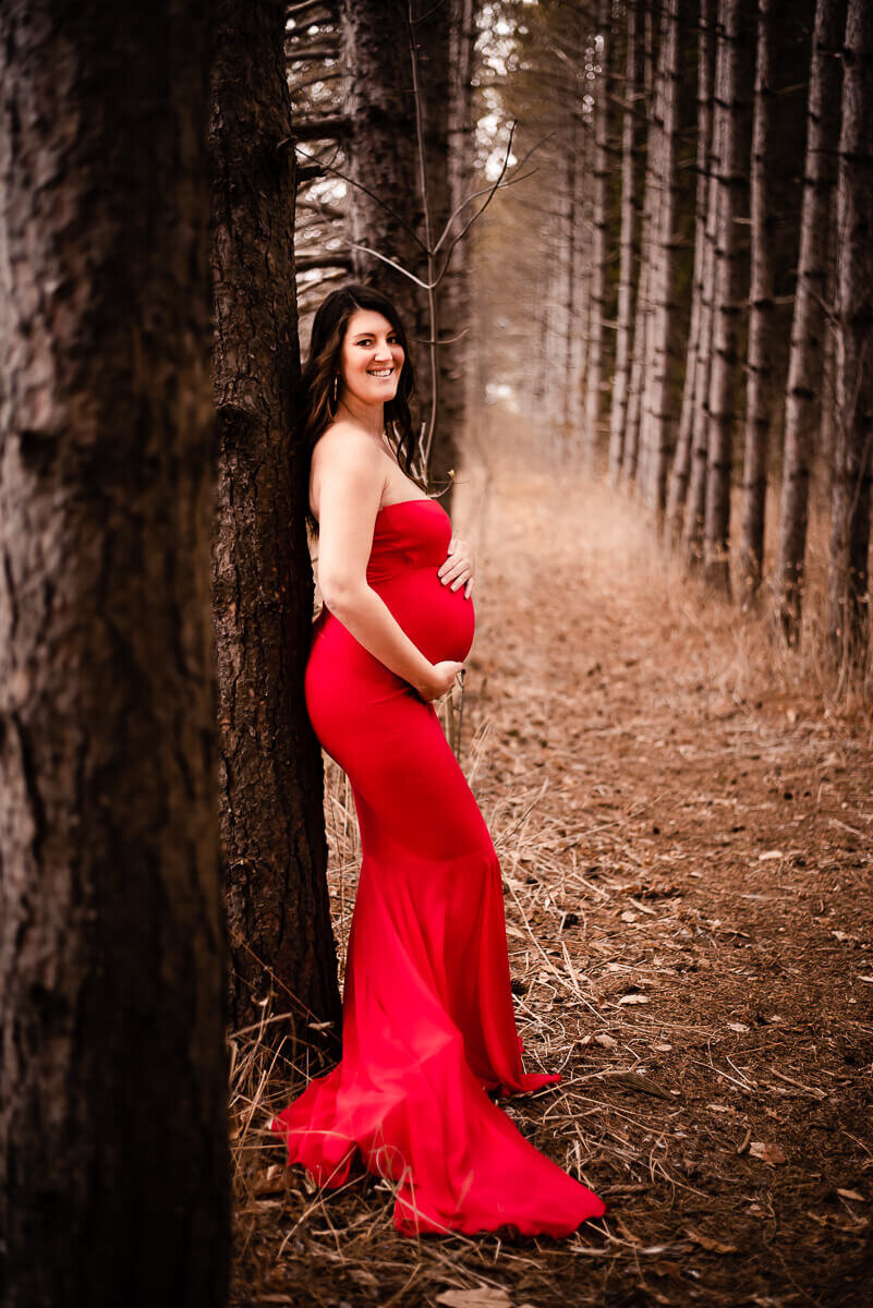 mom wearing mermaid gown for Toronto maternity photography