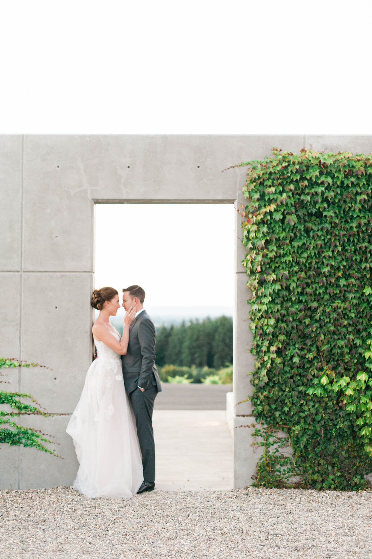 wedding couple posed outside of ponzi winery 