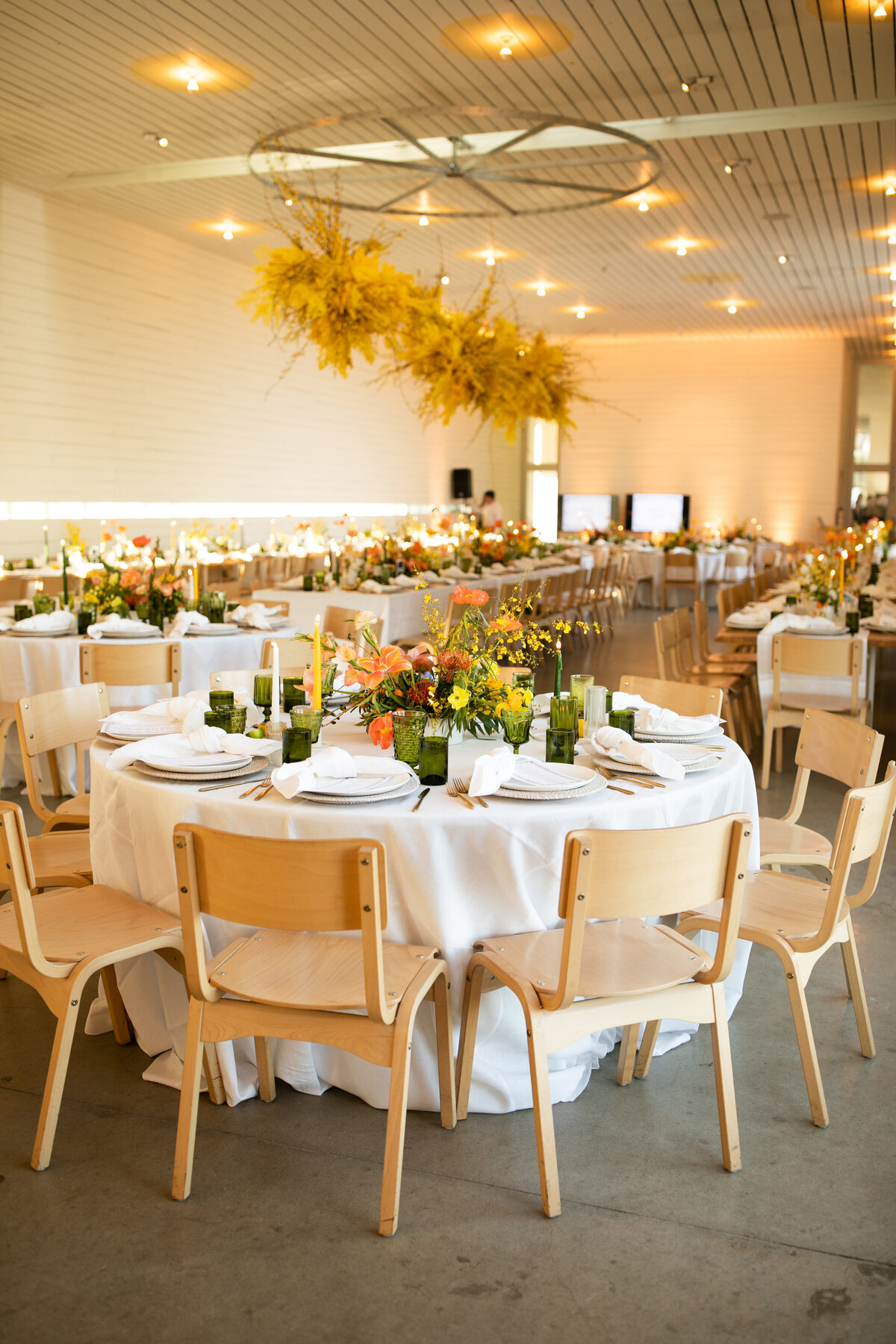 Wedding reception with yellow florals at Prospect House Austin