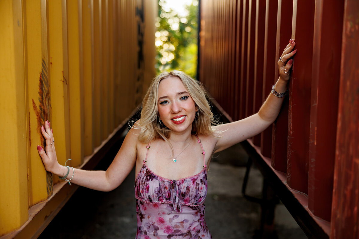 Maria puts her arm on two trailers a truck left in Cleveland.