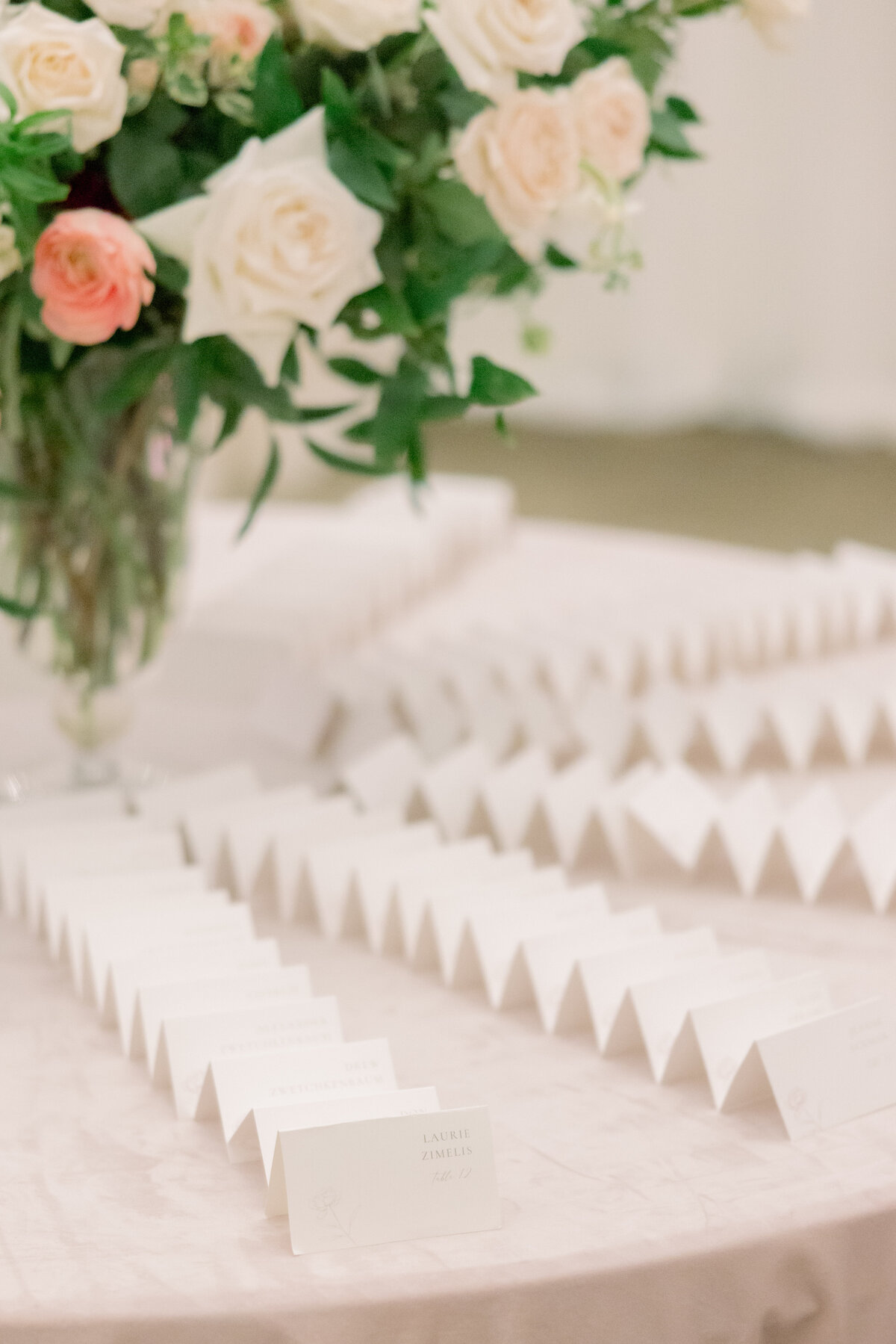 romantic-traditional-guest-place-card-table-long-stem-roses