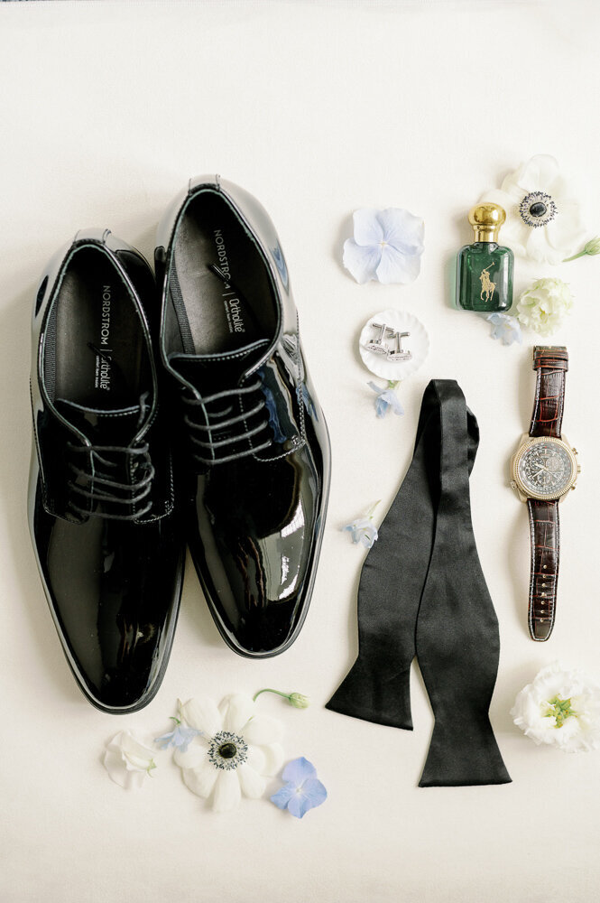 flat lay of groom's items for wedding