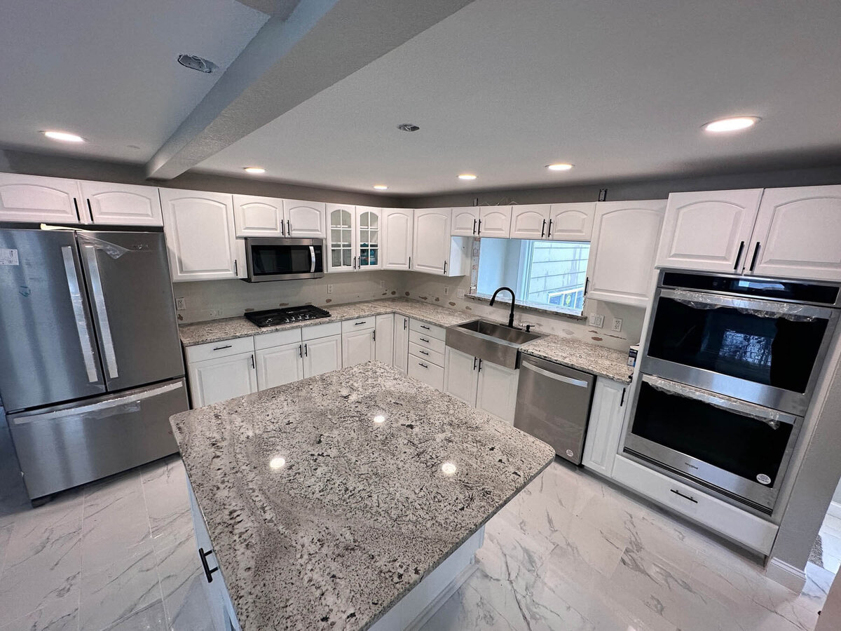 granite-countertops-white-cabinets-kicthen-remodel