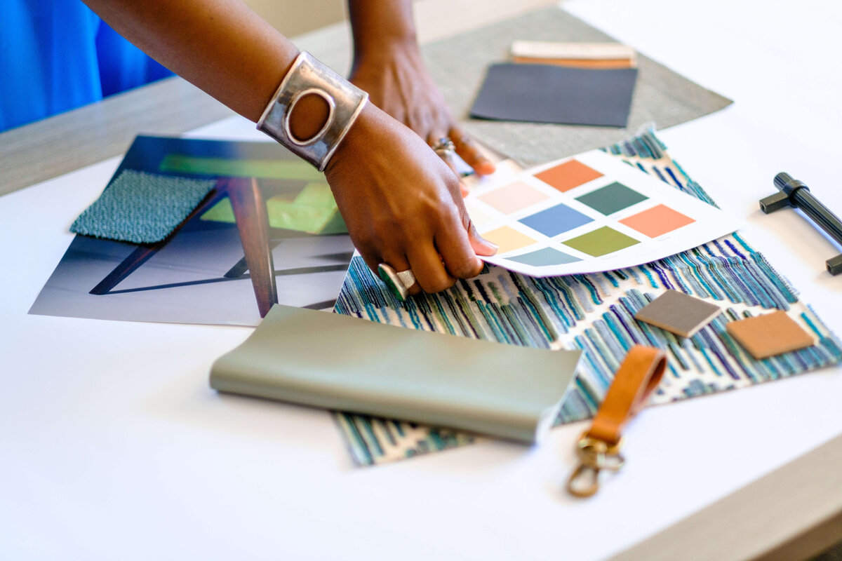 a person holding a color swatch