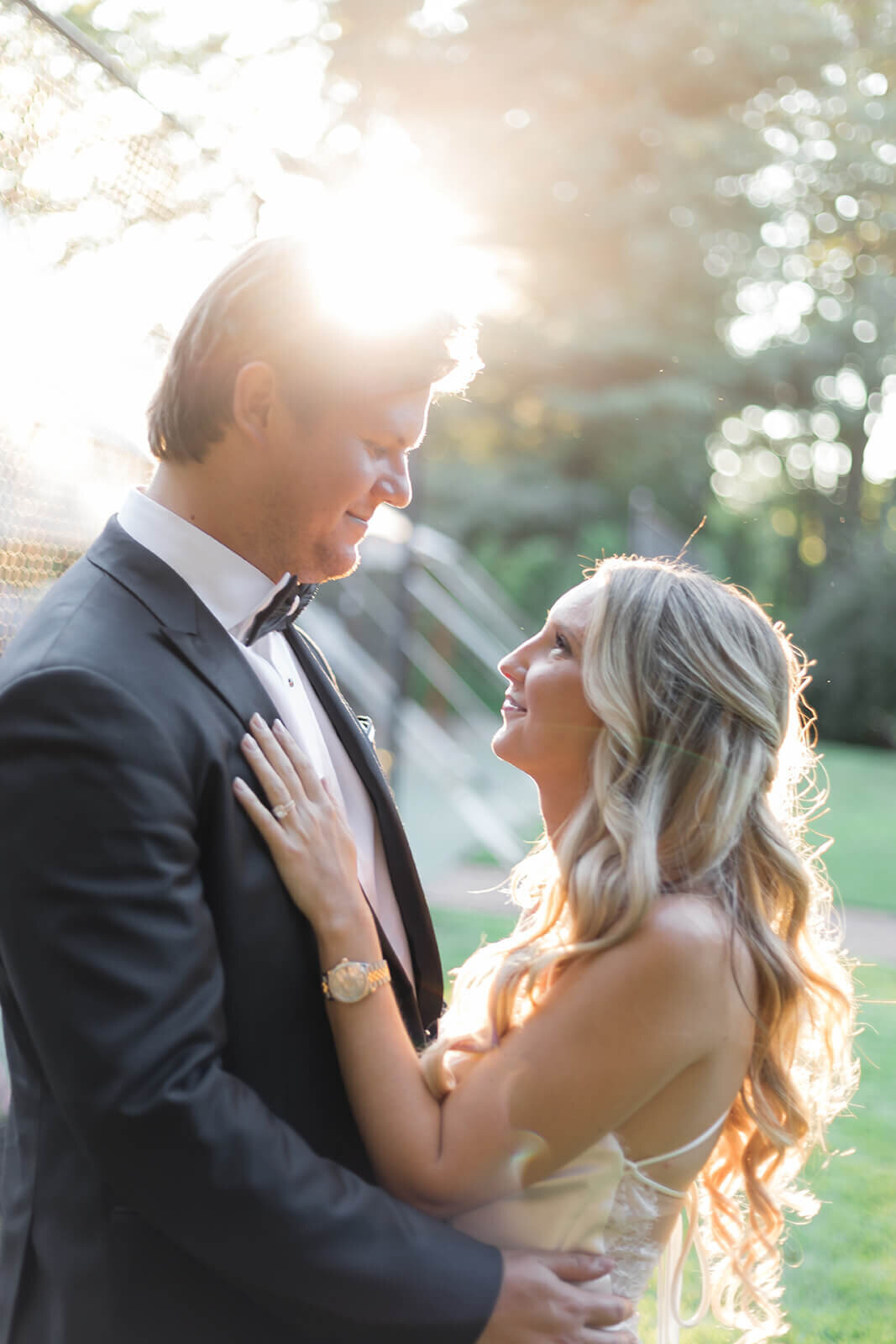 Bride and groom looking into each others eyes at Long Island wedding