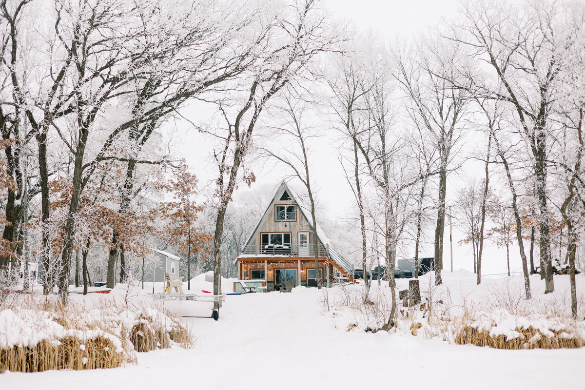 Minnesota winter cabin covered in snow