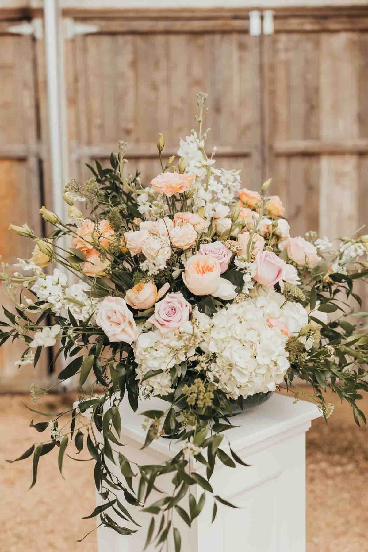 florals sit on top of handmade boxes made by the father of the bride, for the ceremony.