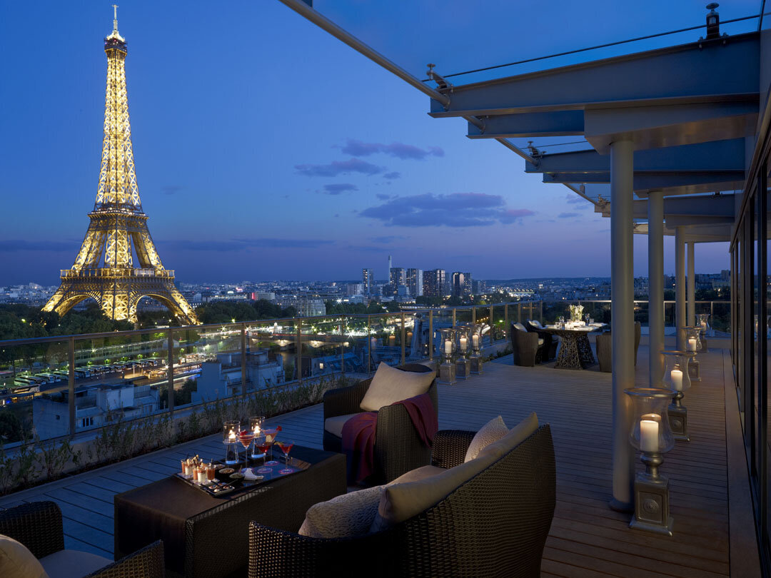 Balcony overlooking the Eiffel Tower at night