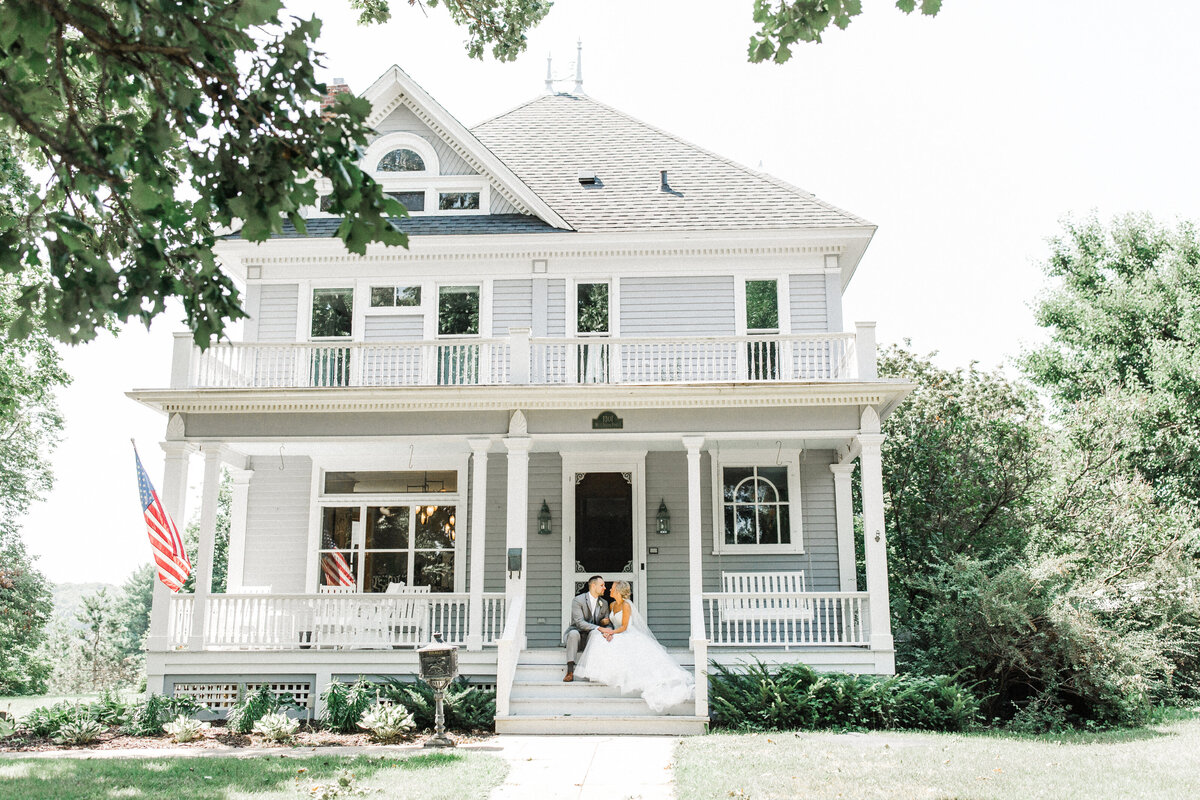 Wedding Couple Sitting on Porch | Upper Case L Photography | Light and airy photography