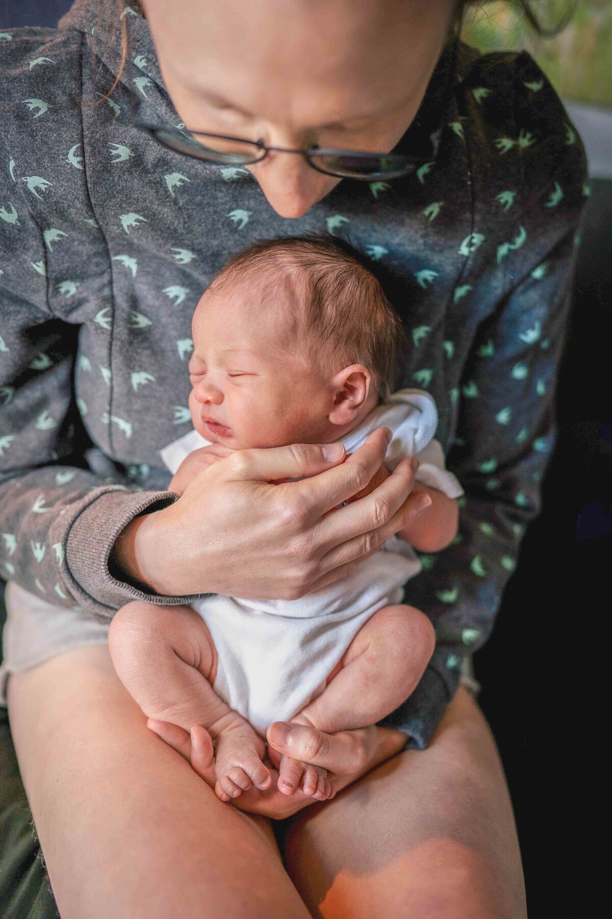 Seattle Newborn Lifestyle Photography of Baby Girl on Mom's Lap