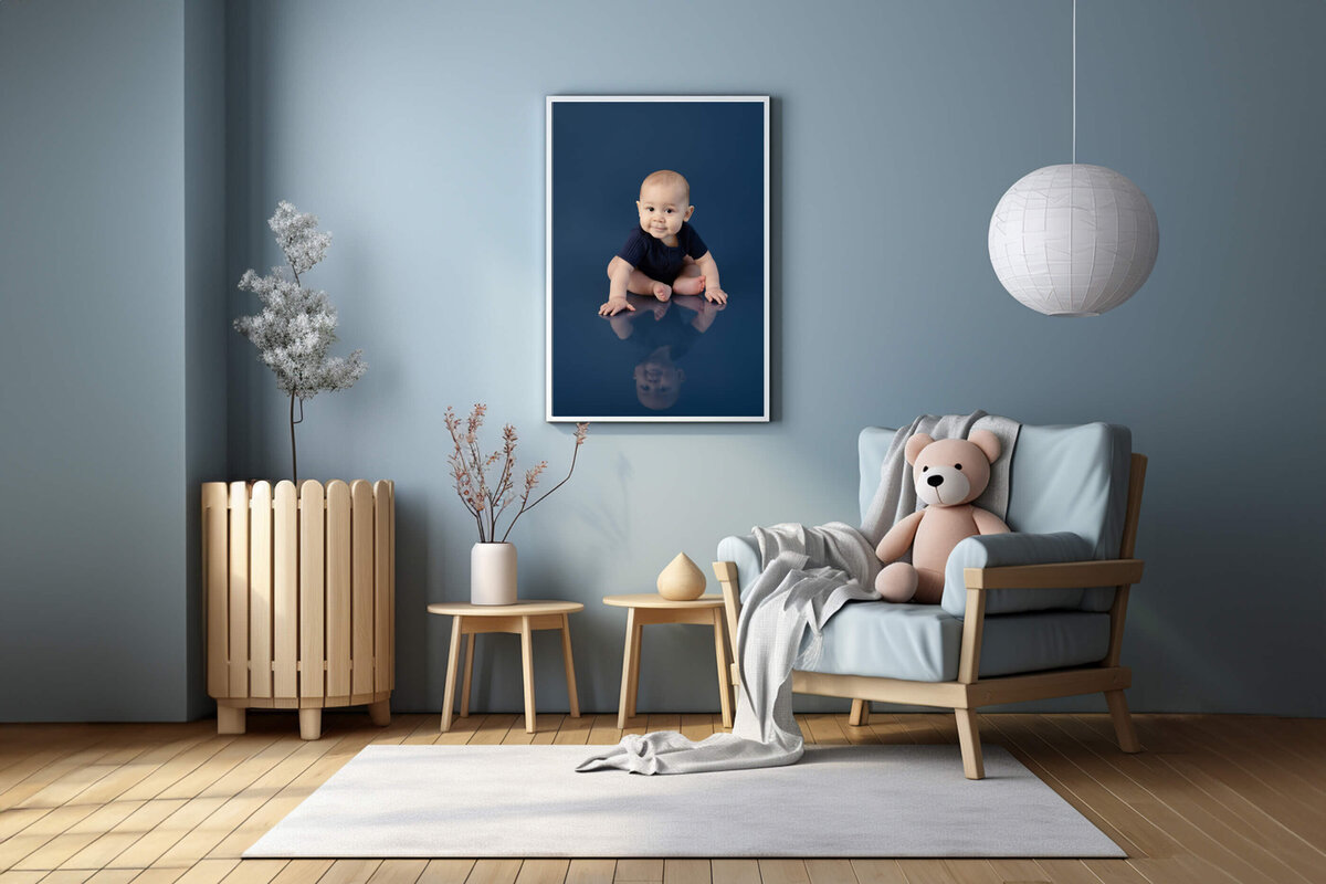 nursery room with a framed photo of a little boy for his kid photography session