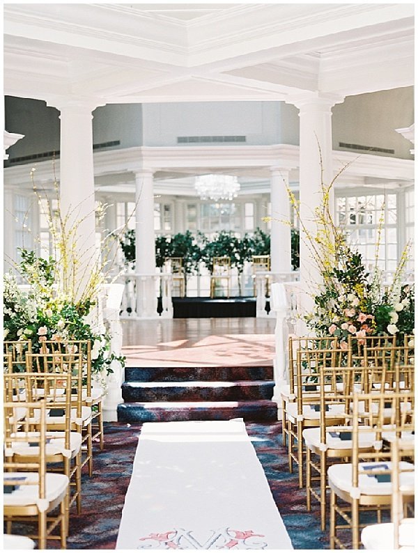 Wedding Ceremony in the Colonnade Washington DC Gold Chiavari Chairs © Bonnie Sen Photography