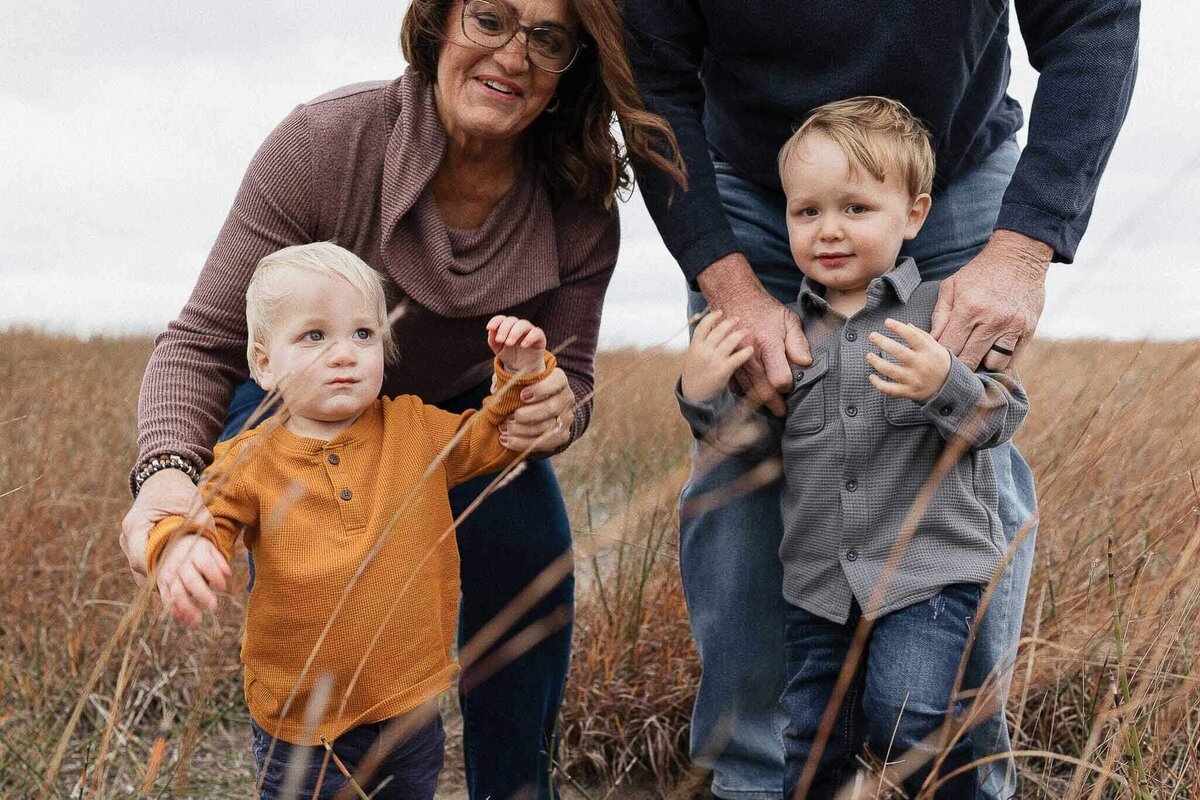 Cleveland grandparents with their grandkids during a family photography session. A cherished moment captured by a Cleveland family photographer.