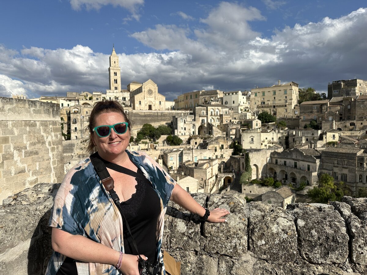 Amy Williams photographed in the sassi of Matera, Italy. The Sassi consist of around twelve levels connected by pathways, staircases and courtyards.