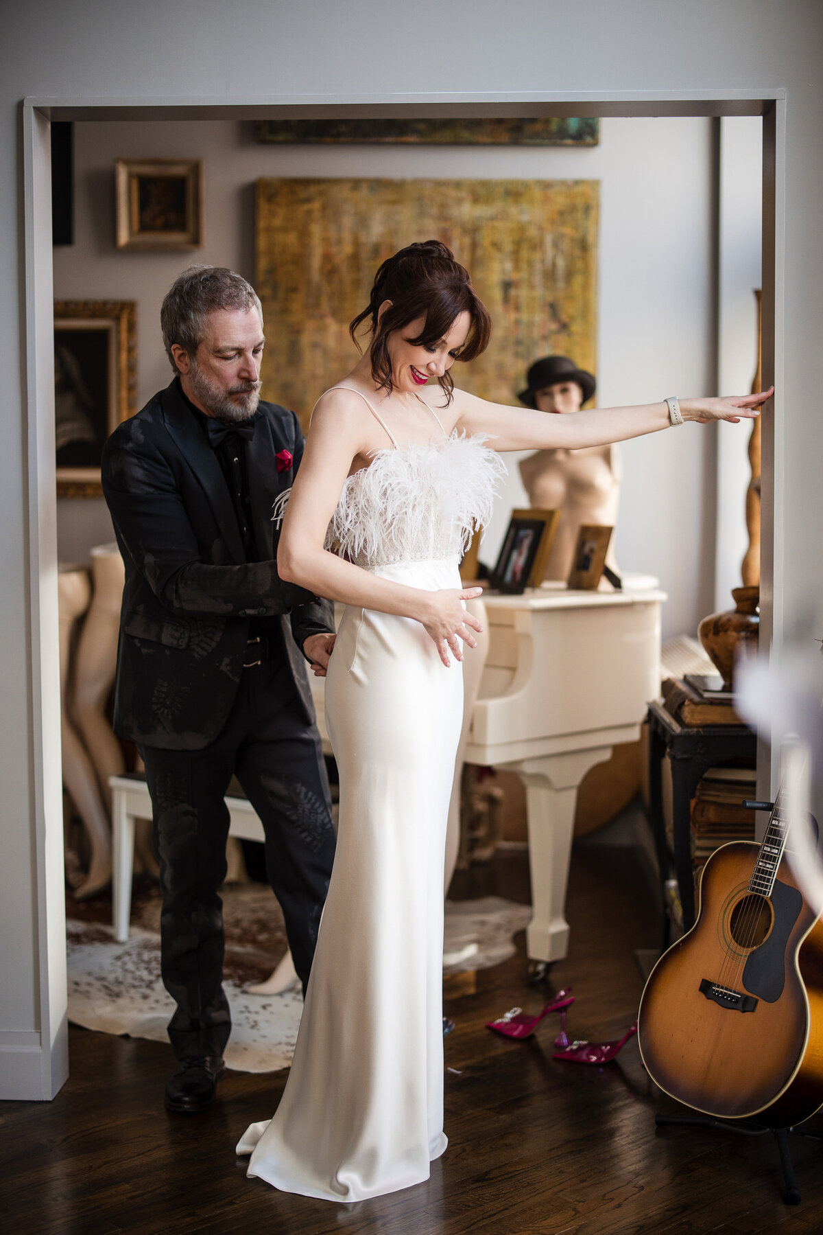 A bride and groom get ready at home before their Manhattan wedding