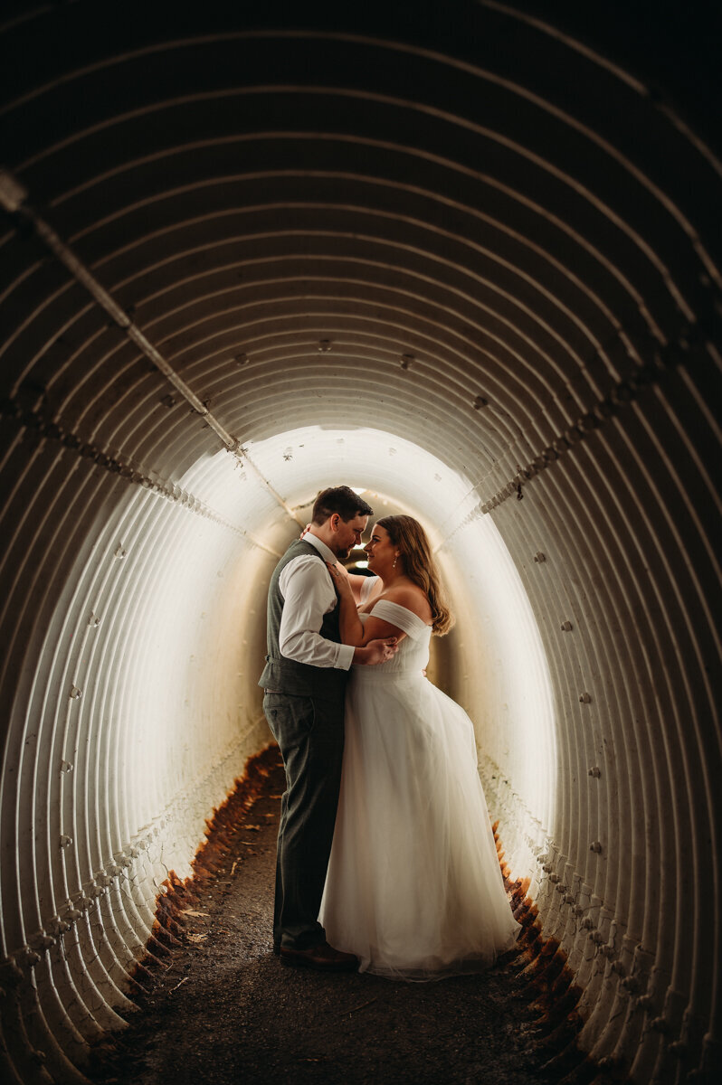 Couple embrace in tunnel at Cuyahoga Valley National Park Ohio