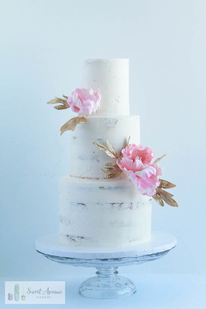 rustic semi naked buttercream with pink and gold flowers, wedding cakes Hamilton ON