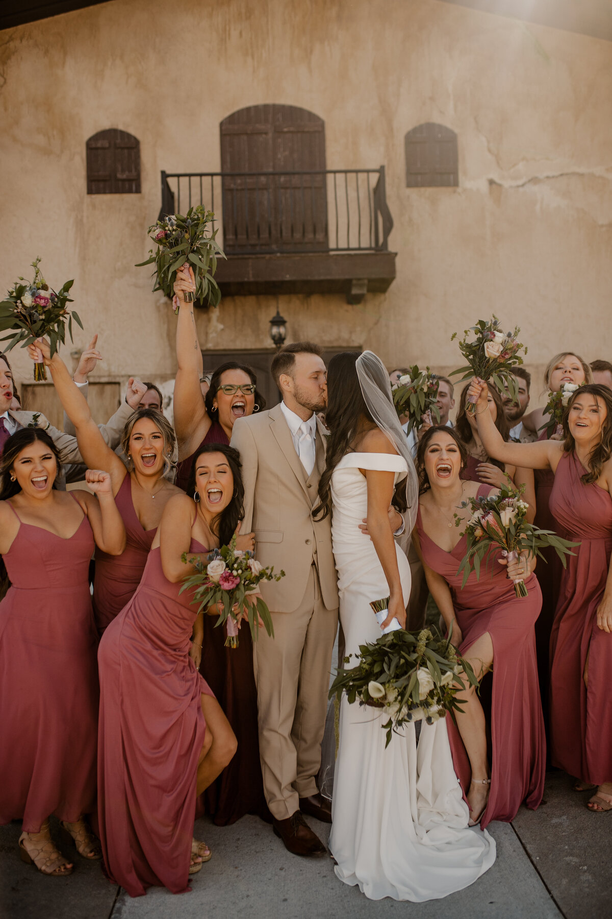 Elegant Bella Terre Vineyard wedding near Omaha, NE, blending luxury and rustic charm. Bride and groom celebrate amidst picturesque vineyard views and timeless architecture, captured by Tori Nichole Photography. A stunning setting for couples seeking a unique and sophisticated venue in the Omaha and Iowa region.