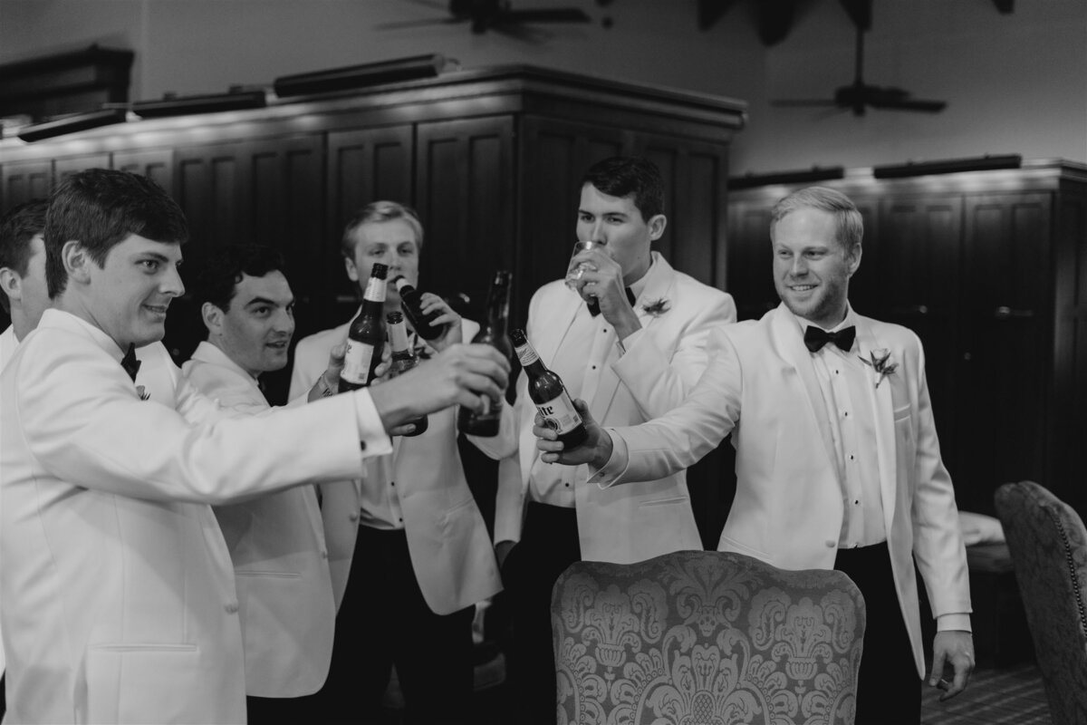 groomsmen cheers before wedding