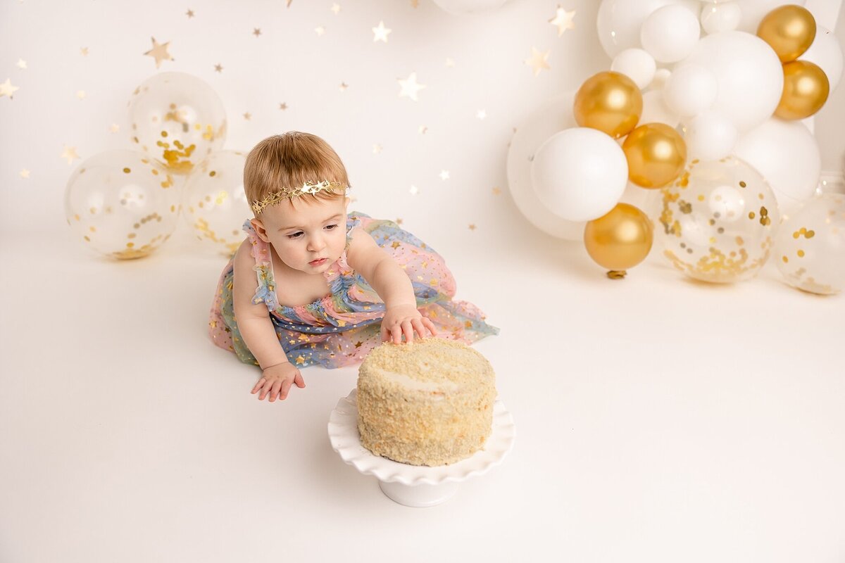 Baby with cake in portland studio