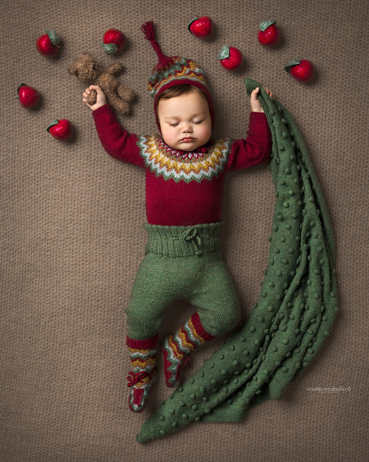 Sleeping Baby in Miou knits with sugared apples.