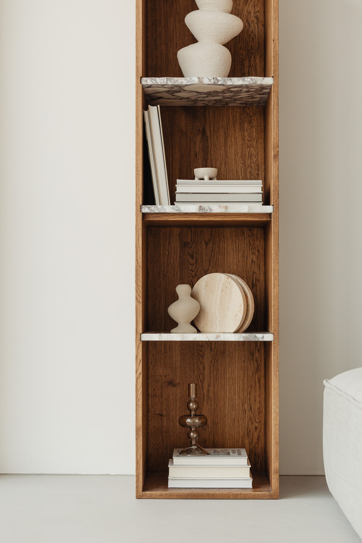 kaboompics_books-on-a-bookcase-marble-shelves-27348