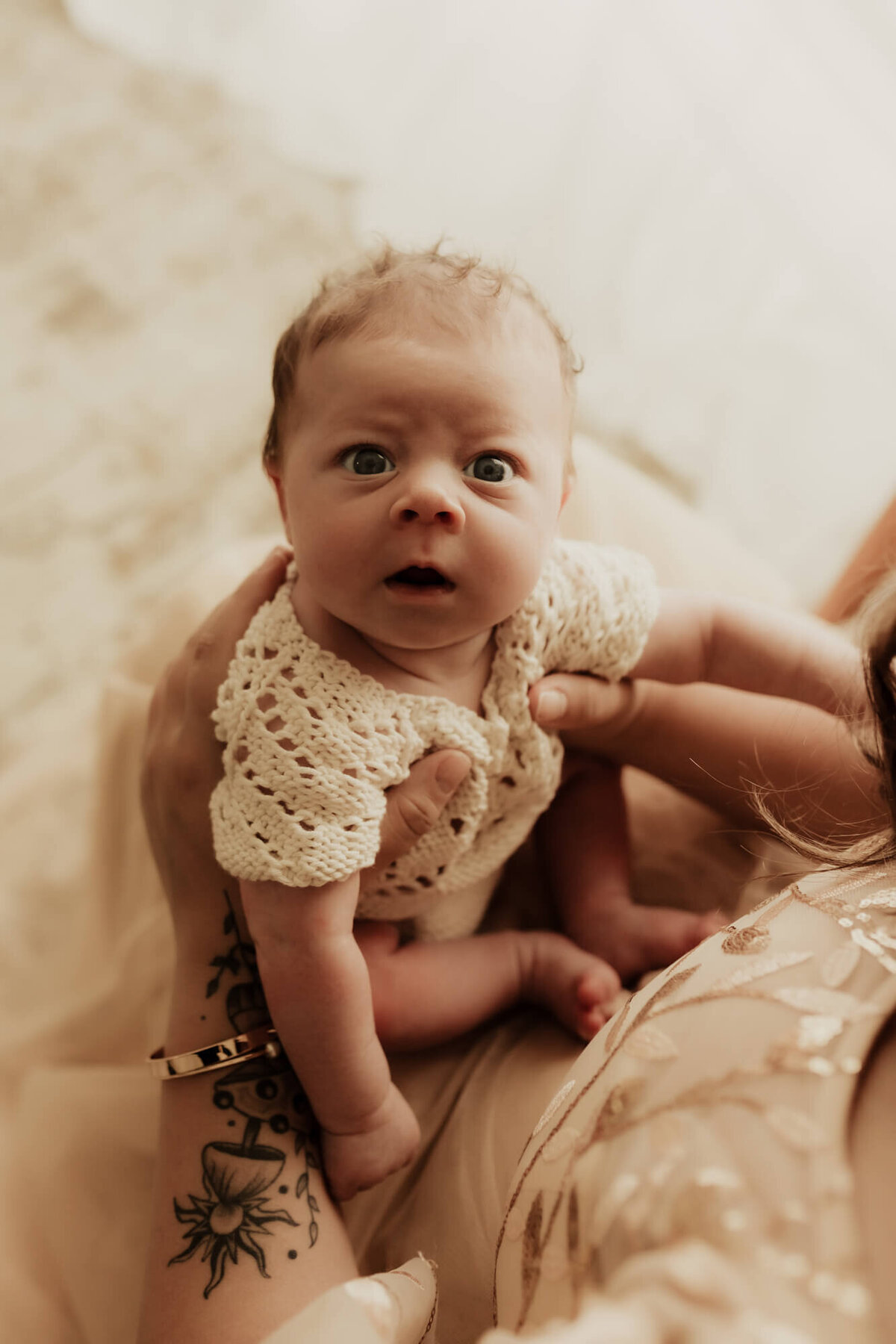 Photo of of a newborn baby girl in OKC.