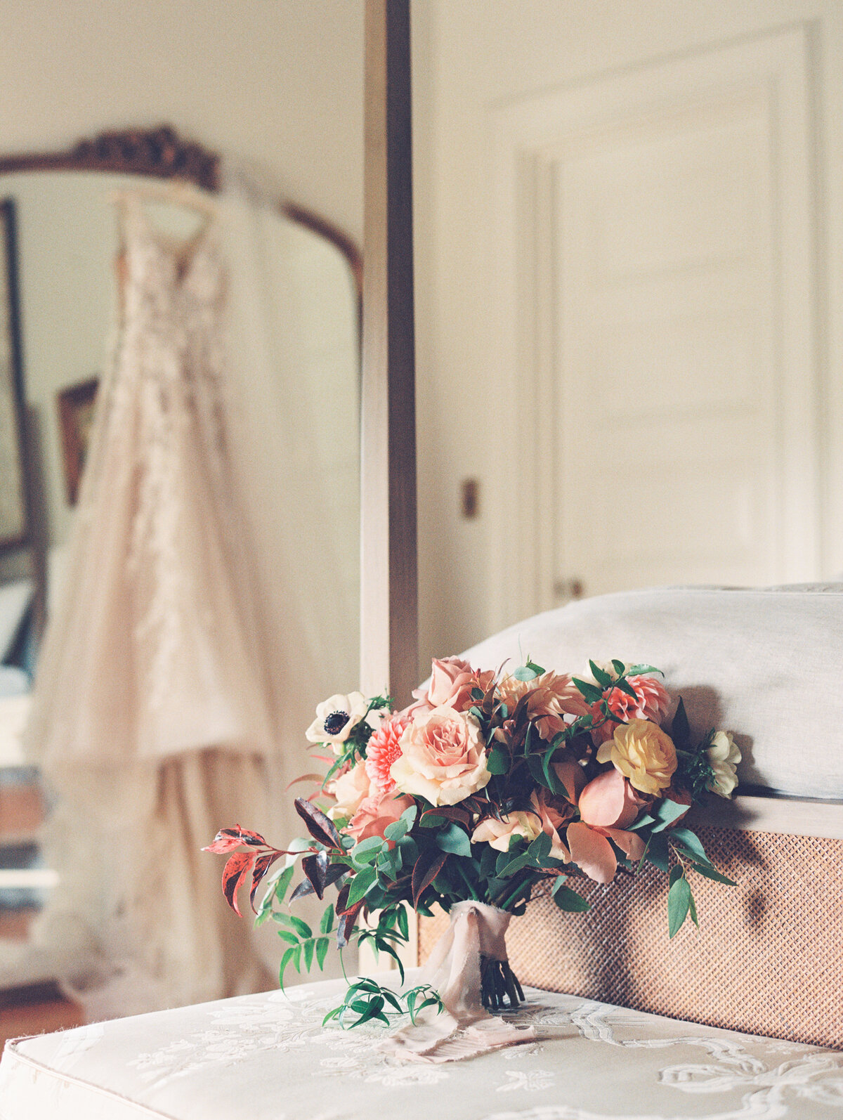 wedding bouquet on bed by Wild Dahlia Florals