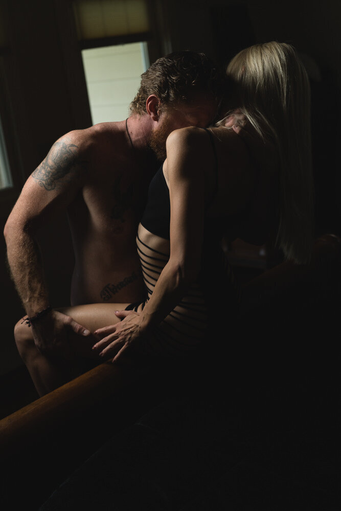 A couple of fitness buffs in a romantic pose.